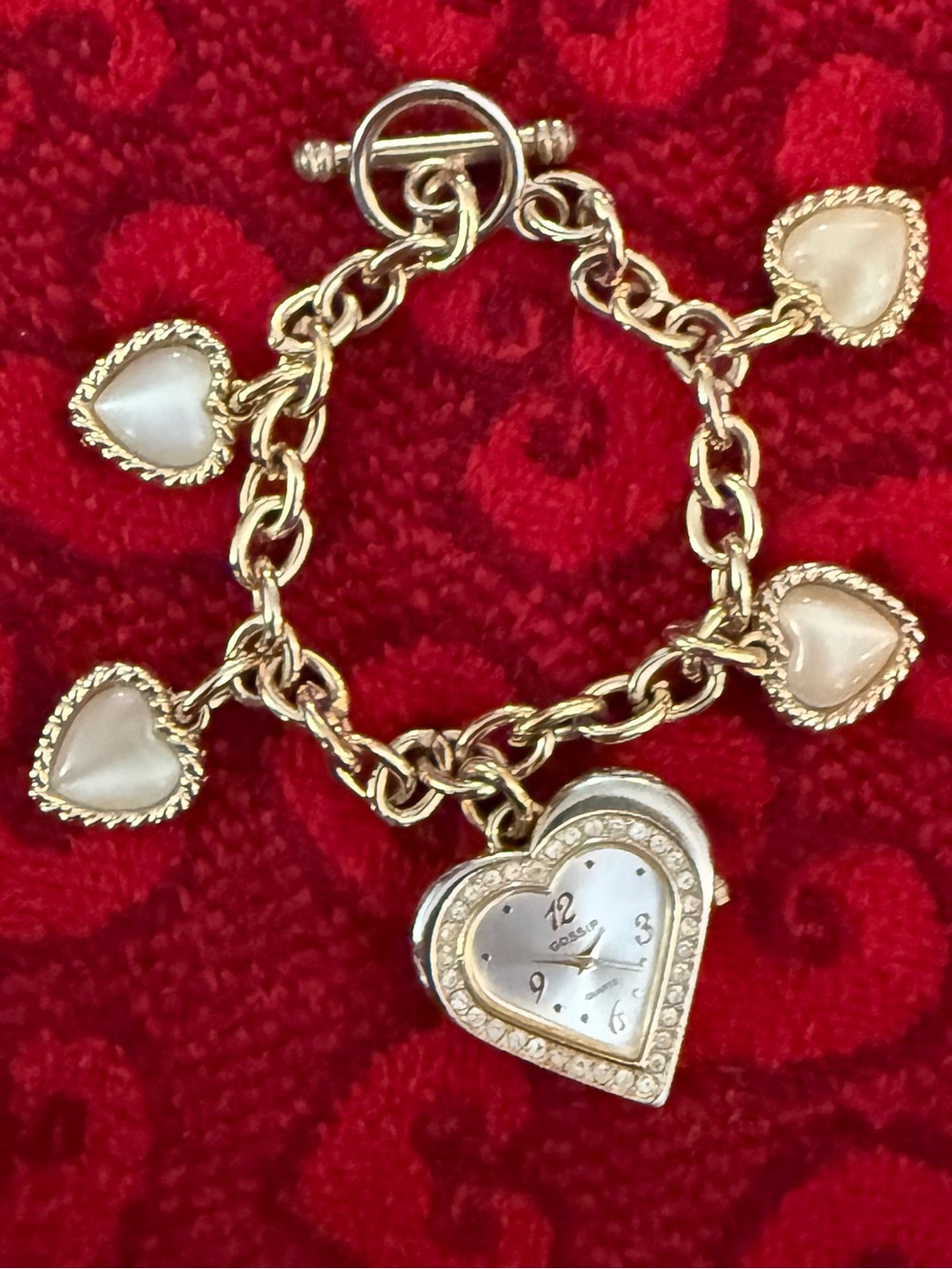 Gossip Gold-Tone Heart Charm Bracelet with Cream Heart Accents and Heart Watch.